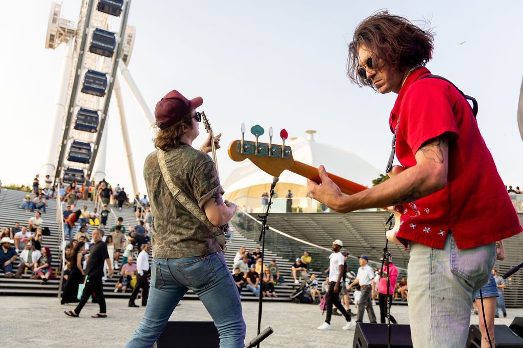 Outdoor music event at Navy Pier featuring Wave Wall Wax artists entertaining the crowd
