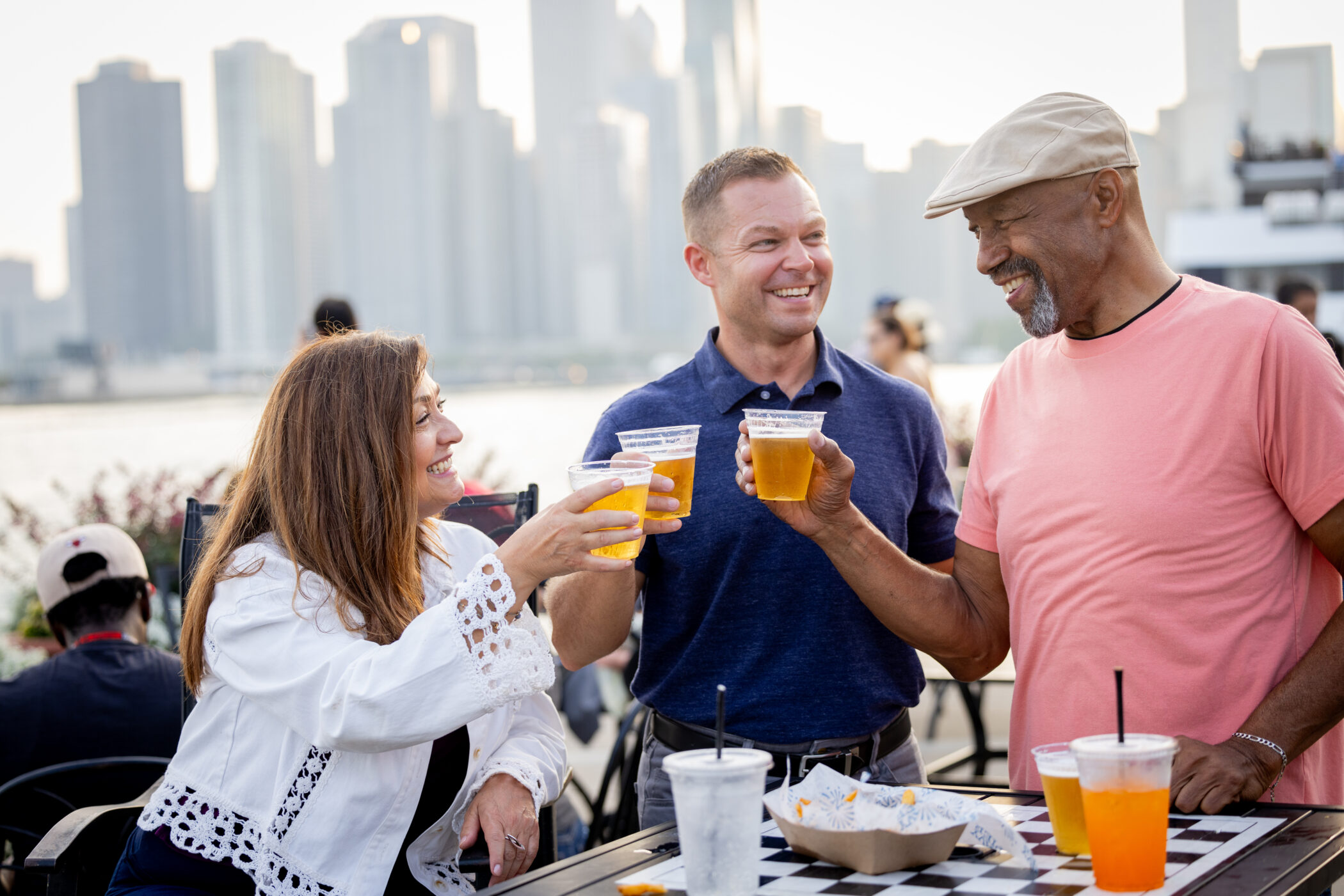 People enjoying beverages at Navy Pier waterfront